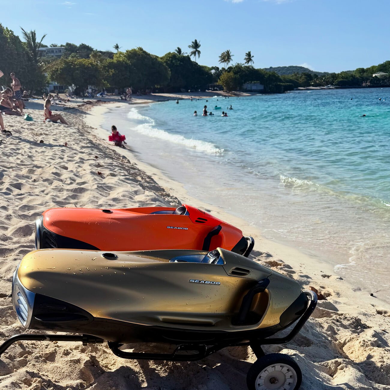 A Sea Bob resting on a white-sand Virgin Islands beach