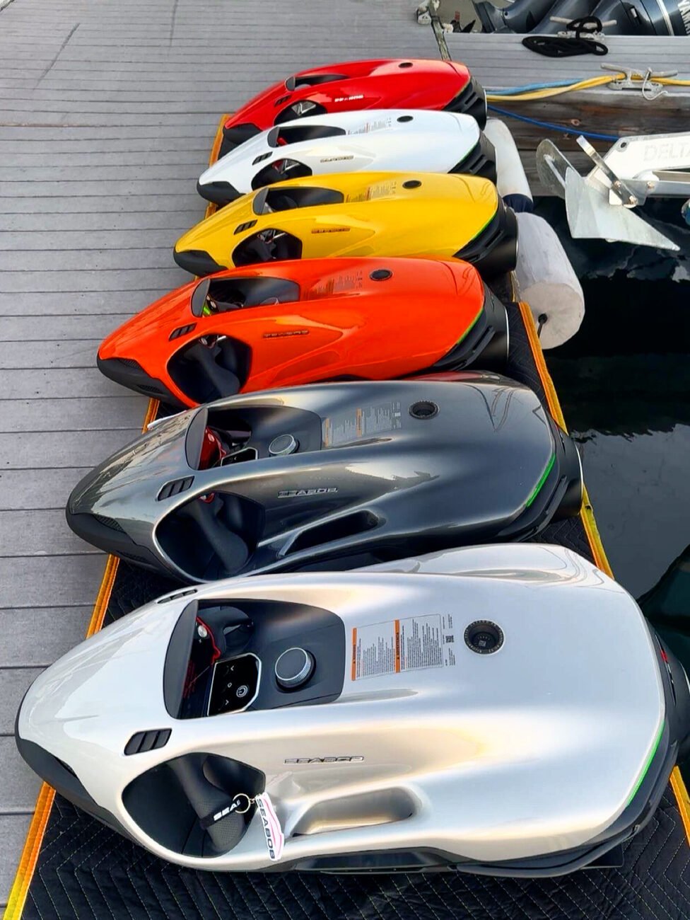 Sea Bobs lined up ready for guests aboard the catamaran