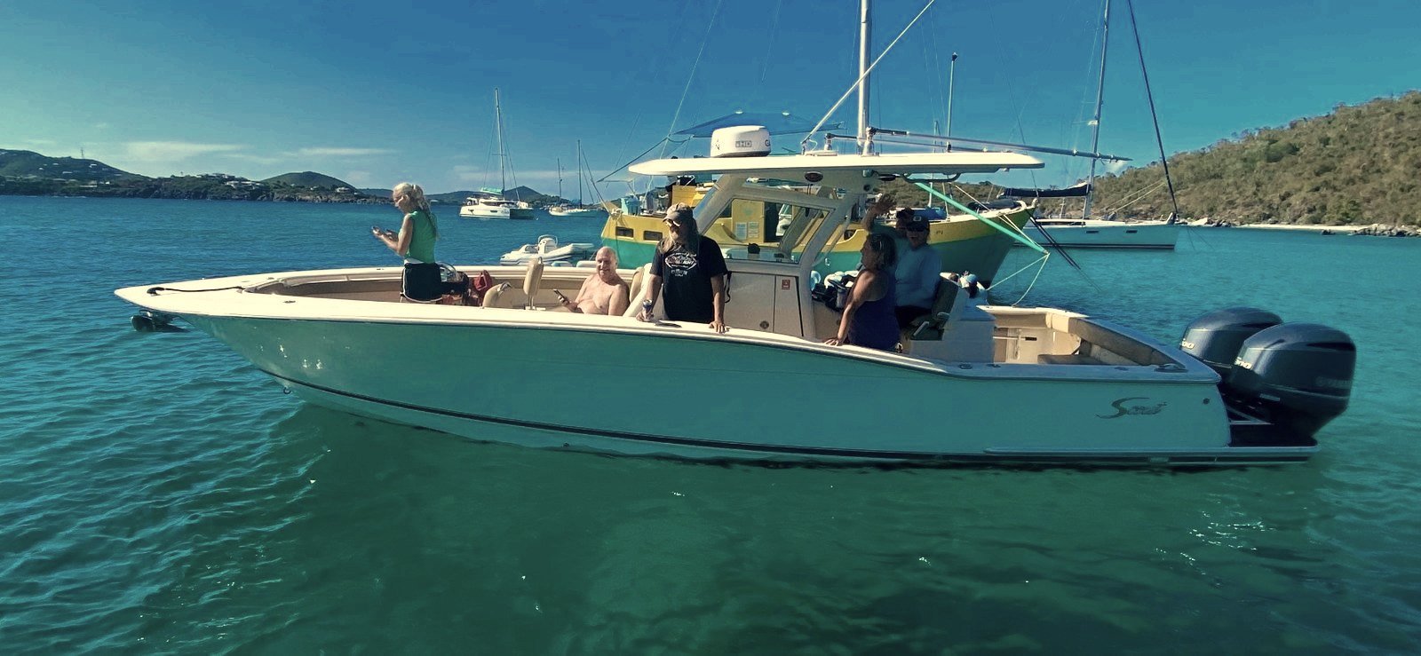 Dream Girl, a 32-foot Scout center-console powerboat, anchored off St. Thomas with guests aboard