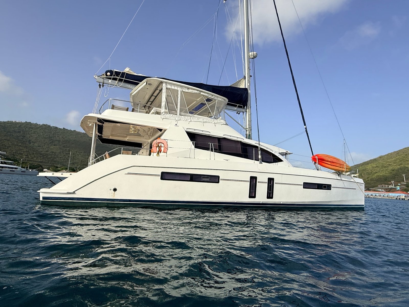 GrooVI, a 58-foot Leopard sailing catamaran, full side profile at anchor off St. Thomas